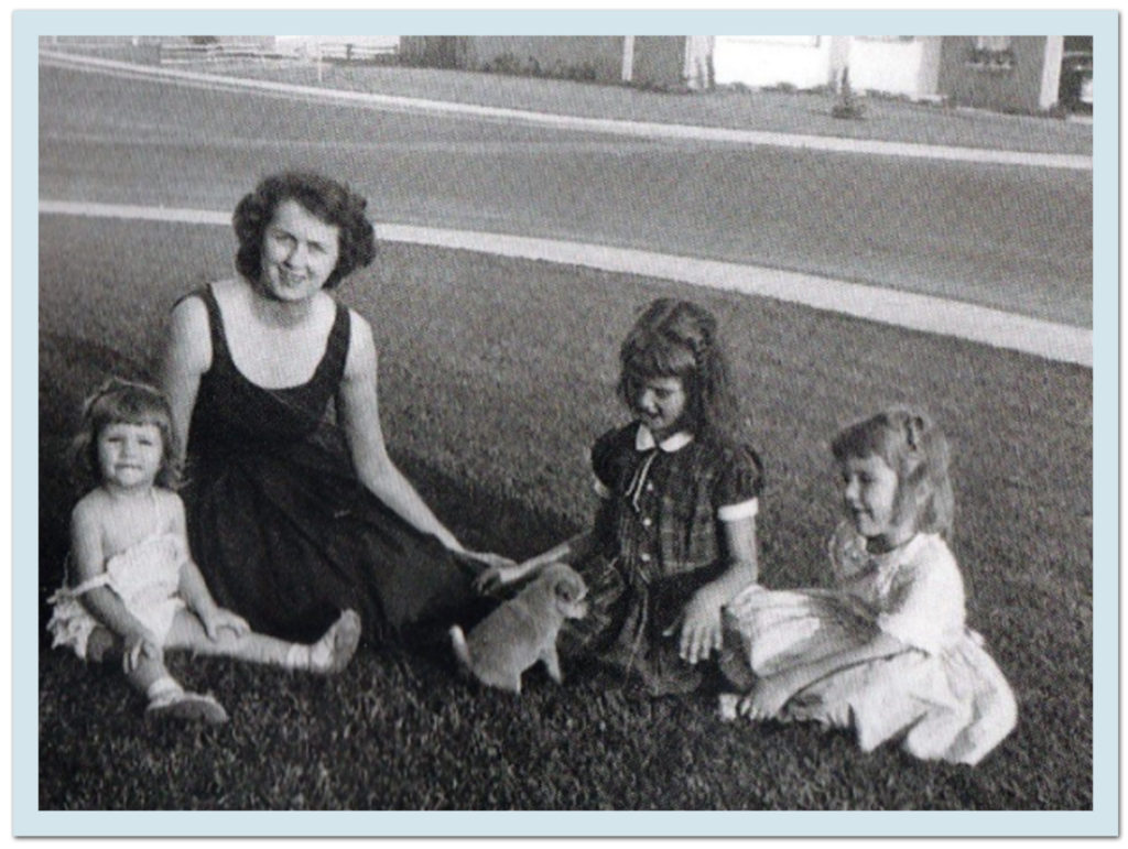 KATHY HOPES PUPPY WILL LIKE HER BEST. SNEAKY JANET CONCEALS TREAT IN HAND TO LURE PUPPY AWAY.