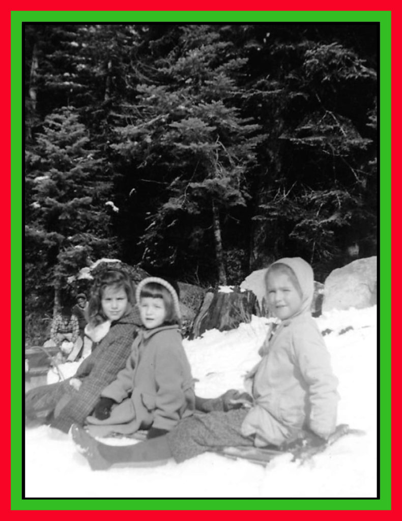 Three sisters in the snow.