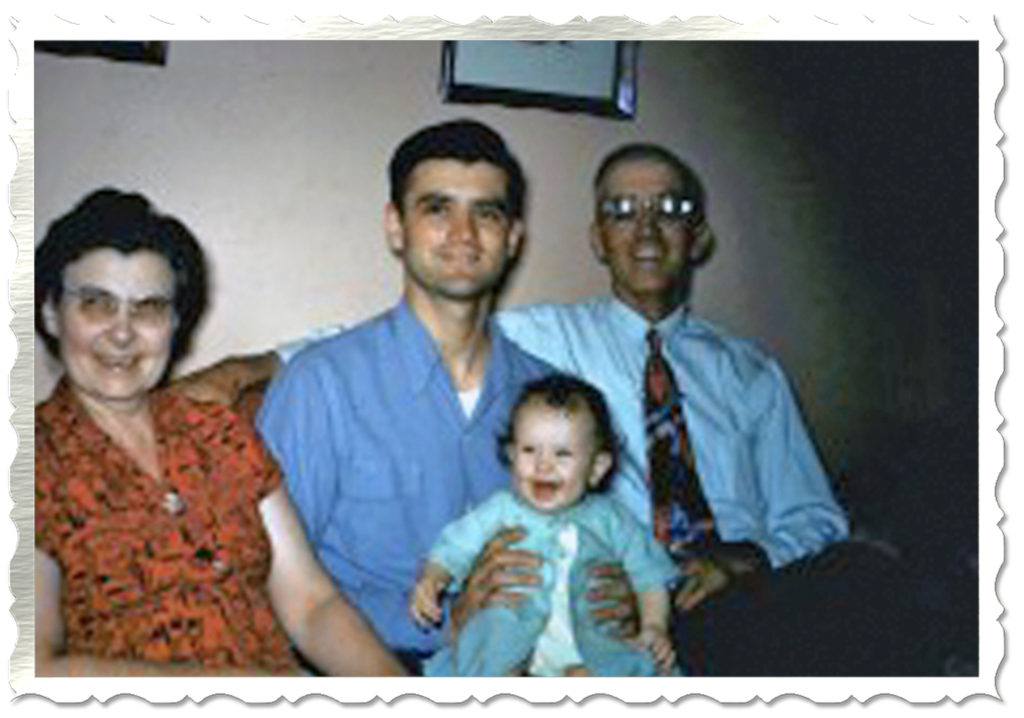Me, with my father and his parents when we still lived in Iowa - early fifties.