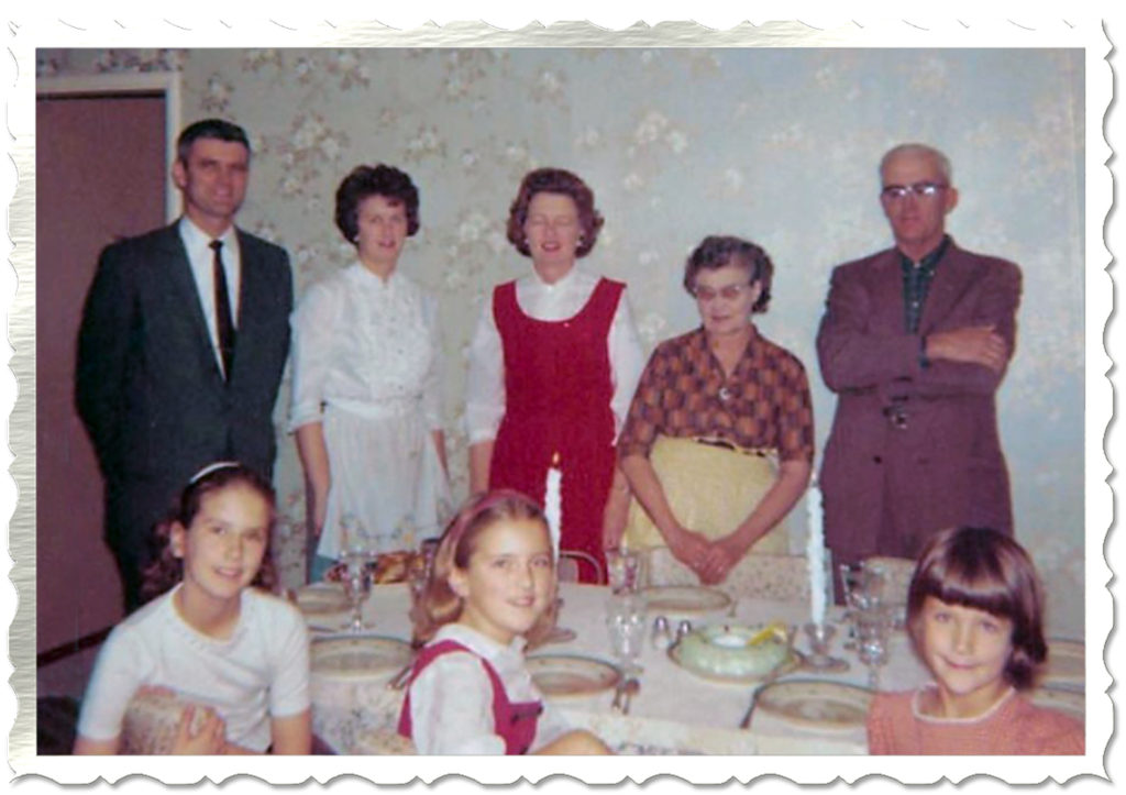 My sisters and I with parents, grandparents and parish worker Marion Voxland - probably 1964 or so. 