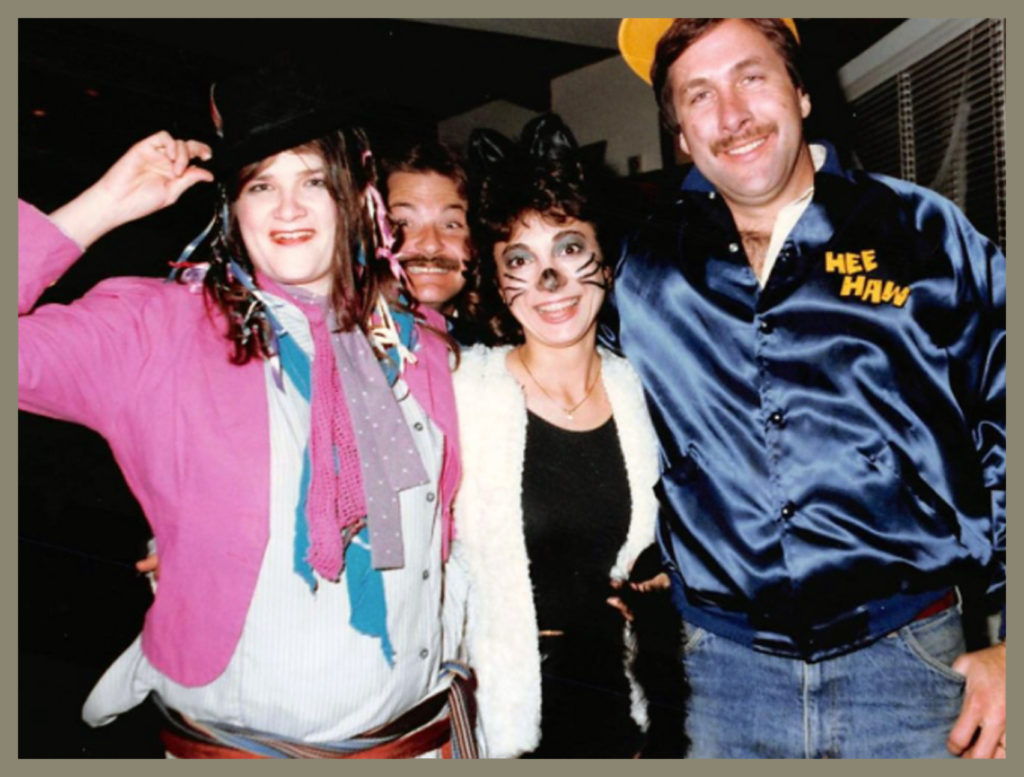 Jake pops his head into photo with Joyce Salter, Patti Akopianz Cavender and Randy Cavender (a Halloweeen party)