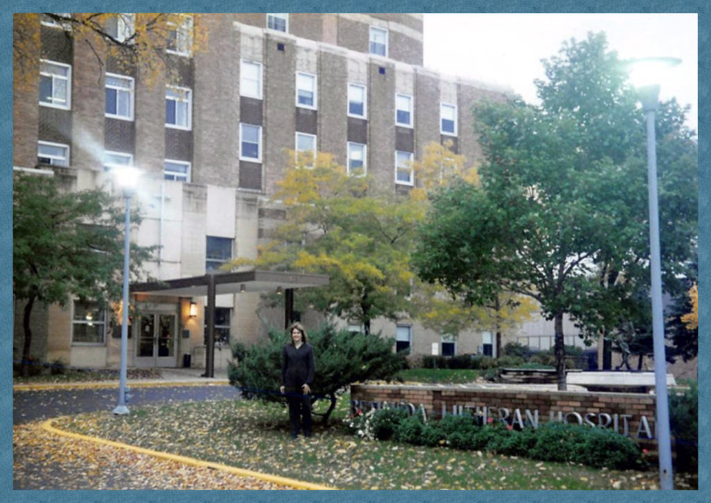 Me in front of the hospital where I was born.