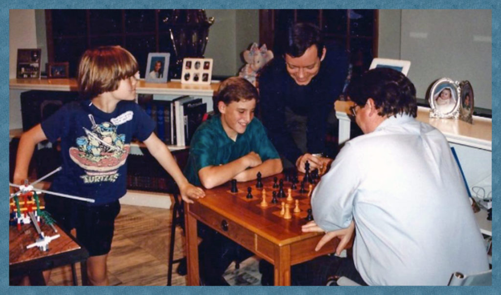 John and Michael challenge Jimmy at chess.