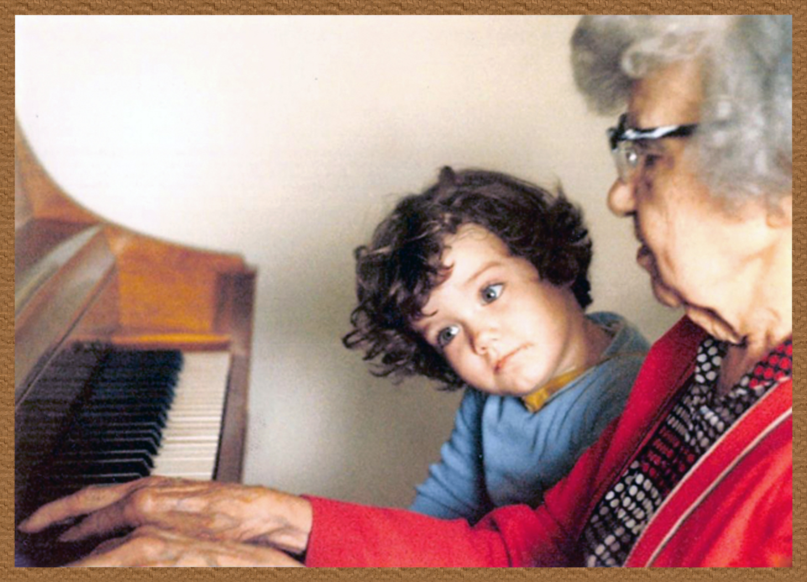 CD absorbs a piano lesson.