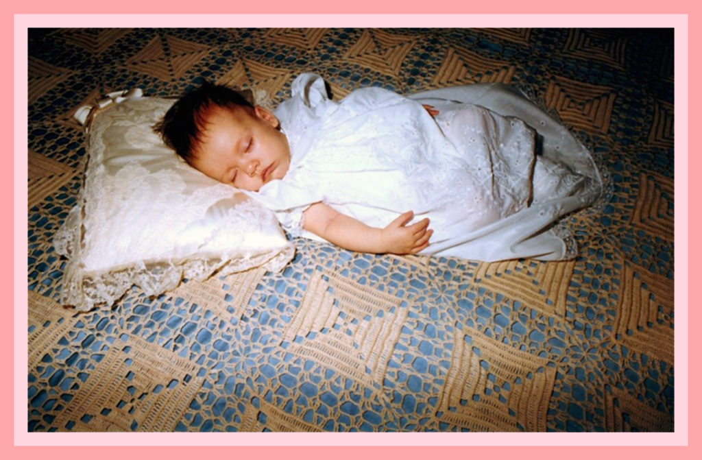 The princess asleep on her royal pillow.