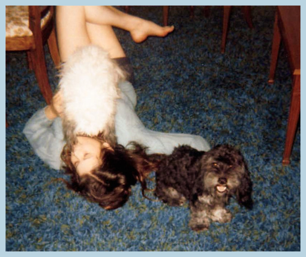 Inga and I lounge on the floor (I have no idea about the white fluff).