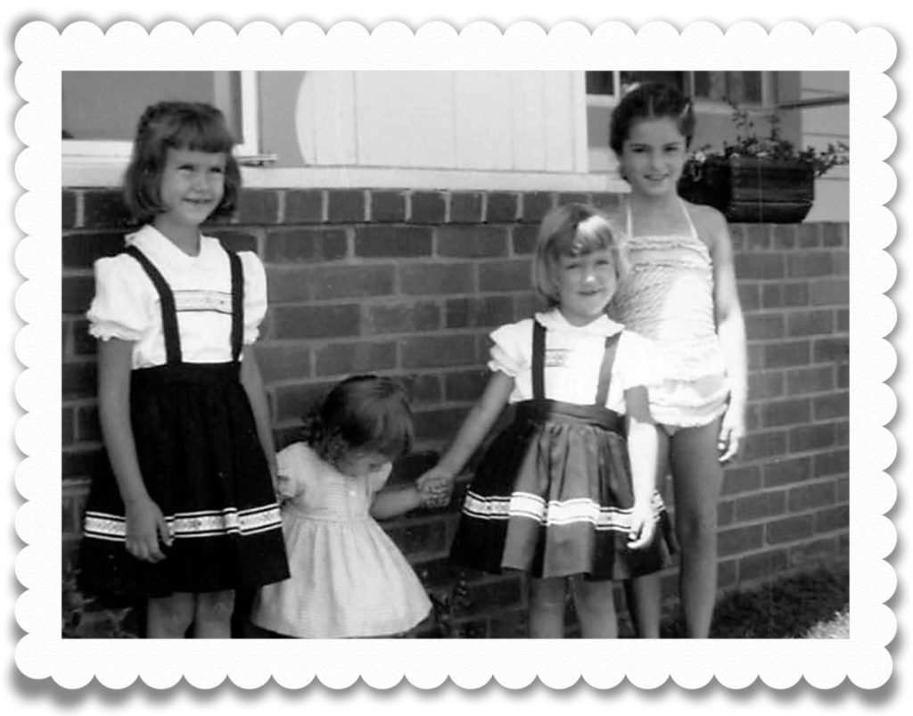 My sisters and I with Alana in August '57